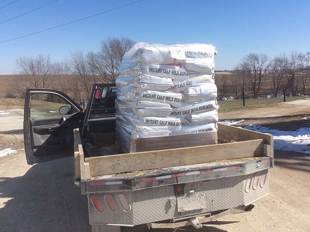 Farmers, ranchers, ag businesses, trucking companies and even service organizations have donated supplies and transportation to ag producers affected by High Plains wildfires. This pallet of milk replacer was donated by an Iowa 4-H club. (Photo courtesy of Mike Berdo)  