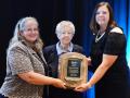 Minnie Lou Bradley, center, was presented the 2018 Livestock Publications Council Headliner Award by Shauna Hermel, left, and Jennifer Carrico, right. (Photo courtesy of ZimmComm)