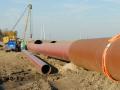 A pipeline project under construction. States across the Midwest and Plains are holding hearings with states and counties deciding on whether to approve projects or tighten permit requirements for carbon pipelines. The Iowa House voted overwhelmingly for a bill Wednesday that would require carbon pipelines to get 90% of easement miles voluntarily before seeking eminent domain approval. The bill now goes to the Iowa Senate. (DTN file photo) 