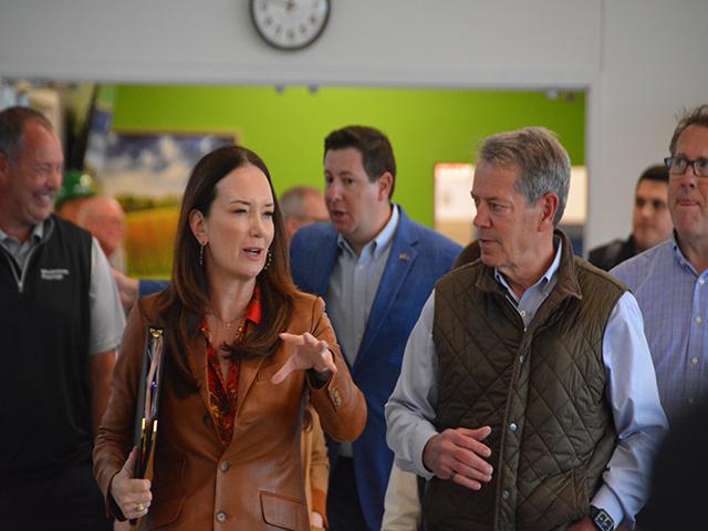Agriculture Secretary Brooke Rollins and Nebraska Gov. Jim Pillen finish touring an independent pork processor, Wholestone Farms, on Monday in Fremont, Nebraska. Rollins used the trip to tout a set of policies for small farmers and sign a waiver allowing Nebraska to ban sugary drinks from SNAP purchases. (DTN photo by Chris Clayton) 