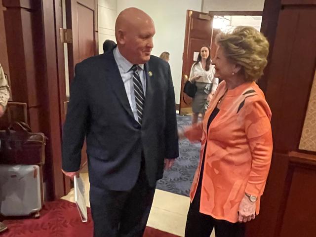 House Agriculture Committee Chairman GT Thompson, R-Pa., and Senate Agriculture Committee Chairwoman Debbie Stabenow, D-Mich., visit briefly during a meeting with reporters back in April. The two chairs remain divided over spending and funds for the next farm bill. (DTN photo by Jerry Hagstrom) 