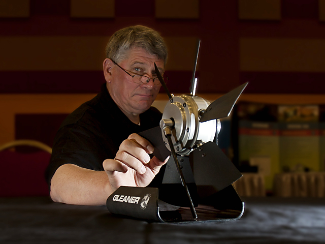 AGCO&#039;s Kevin Bien shows off a scale model of the SmartCooling fan that won an AE50 Award for Innovative Technology in 2011. (Photo courtesy AGCO)
