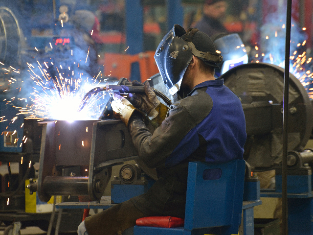 Custom-made welding stations are among the innovations at the new Kinze facility built specially to assemble 4900 Series planters. (DTN/The Progressive Farmer photo by Jim Patrico)