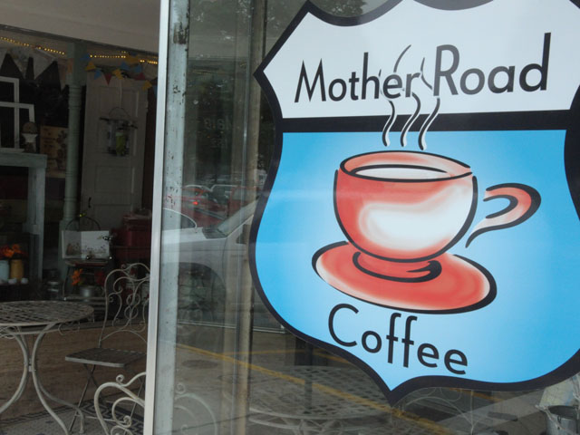 A sign from a coffee shop on the square in Carthage, Missouri. 