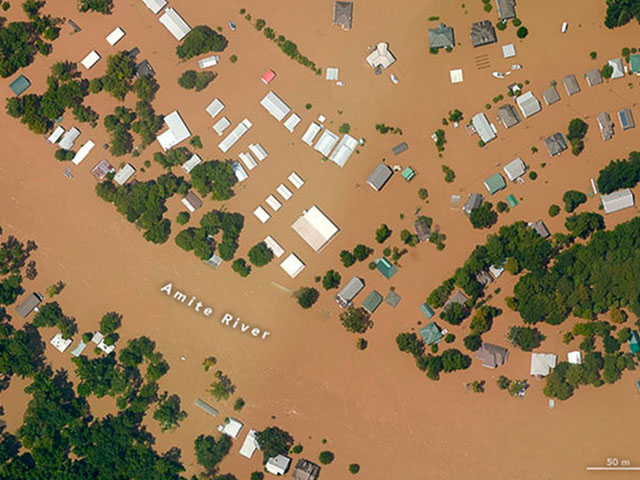 This photo shows recent flooding along the Amite River at Ascension Parish, Louisiana. (Photo courtesy of NOAA)
