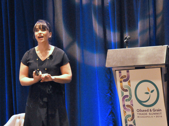 Eve Turow Paul explains to a group of commodity buyers and sellers how the millennial generation sees food compared to older generations. 