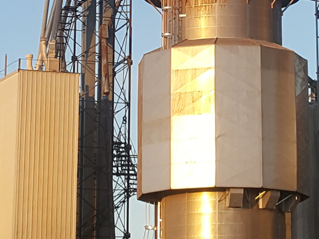 A heat reclamation system sold by GSI for tower dryers separates hot dry air from wet air to save energy costs. It can be retrofit on many existing dryers.