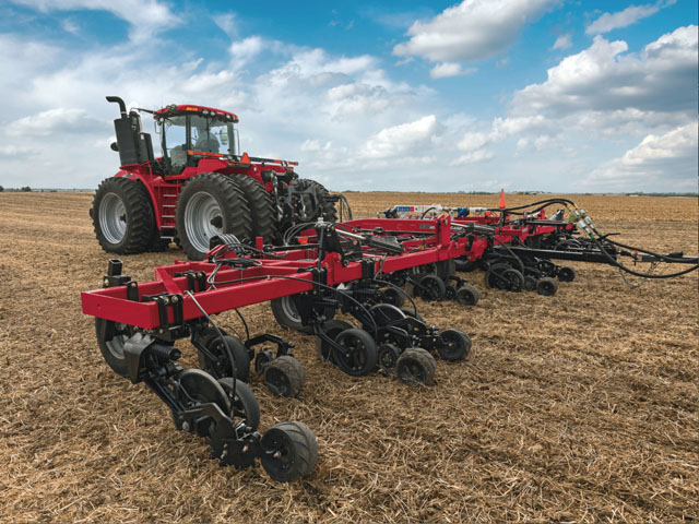 Greasing an implement is one of those jobs that, while at times requiring gymnastic ability, is a task not to be neglected. (DTN/Progressive Farmer file photo)