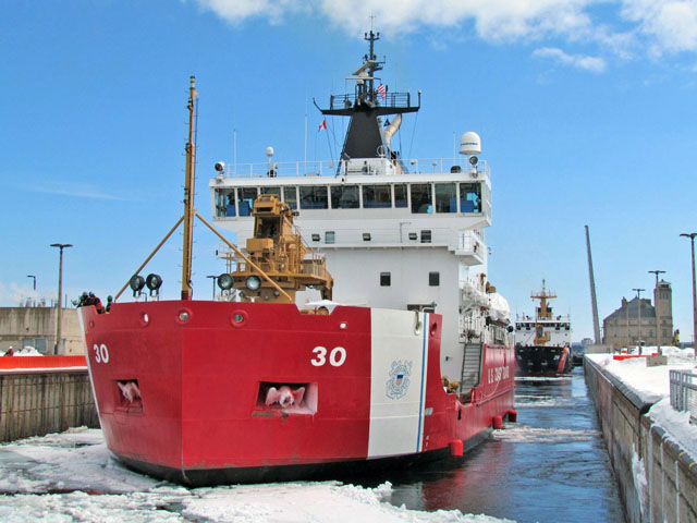 On March 19, 2019, U.S. Coast Guard icebreakers Mackinaw and the Alder and the Canadian Coast Guard icebreaker Samuel Risley moved through the Soo Locks on their way to the Port of Duluth/Superior to begin ice-cutting operations. (Photo courtesy of the U.S. Army Corps of Engineers Detroit District)