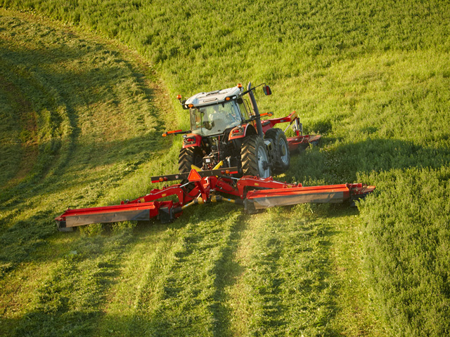 AGCO&#039;s new DM1300 series butterfly mower system allows three mowers mounted front and back of a tractor to work in tandem for a 30-foot width cut. The system is branded Hesston by Massey Ferguson. (File photo by AGCO)