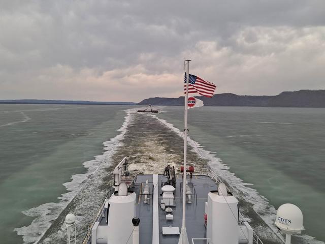 Anthony Belt, leadman on the tow cutting ice, took this picture of the Motor Vessel Aubrey B. Harwell Jr. busting through the stubborn ice on Lake Pepin to help the MV W. Red Harris (visible in the background) get unstuck and on its way to St. Paul, Minnesota with its load of nine barges. (Photo courtesy of Anthony Belt)