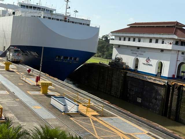 The car carrier RCC America being lifted in the second step of the Panama Canal's Miraflores locks. (DTN photo by Urban C. Lehner)