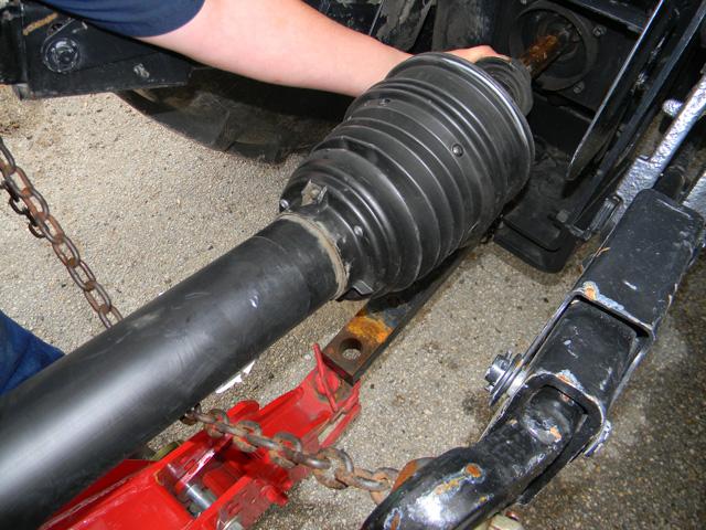It happens in a second. Black-and-blue fingernails are an all-too-common result from hooking up a drive shaft to the PTO shaft. (Progressive Farmer photo by Steve Thompson)