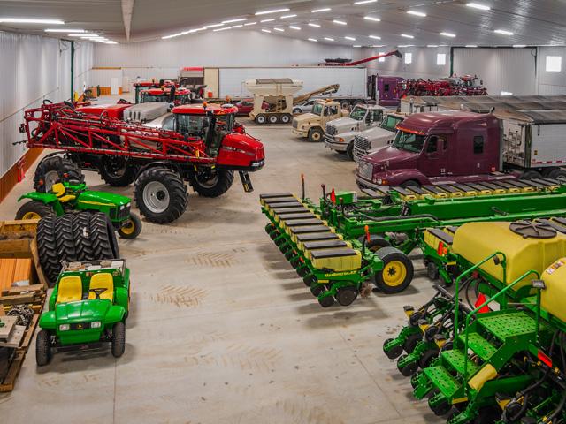 The main floor space of the shop is 125 feet wide and 260 feet long. The working space can be expanded onto a 40-foot-wide concrete pad outside that runs nearly the length of the building. (DTN photo by Rob Lagerstrom)