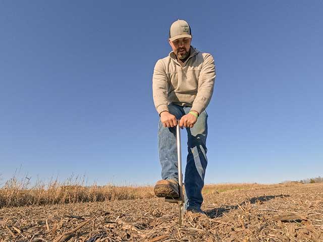 Soil testing for soybean cyst nematode (SCN) helps identify problems and create a management plan. Zachary Grossman, of Tina, Missouri, takes samples this fall. (DTN photo by Jason Jenkins)