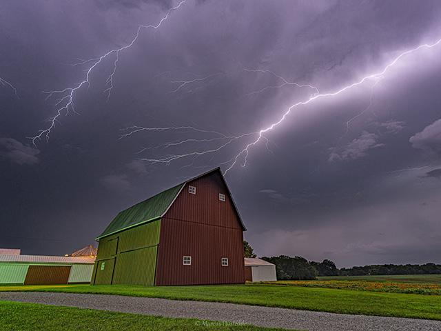 Lightning spreads out over a barn in the Corn Belt. (DTN photo by Marcus Hustedde)