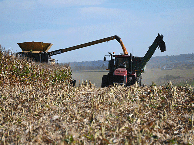 An Iowa farmer harvests corn earlier this month. The ARC-PLC programs did not pay out on the 2021-22 crops for most of the country unless the county suffered extremely low yields that overcame the higher commodity prices. (DTN image by Matthew Wilde)
