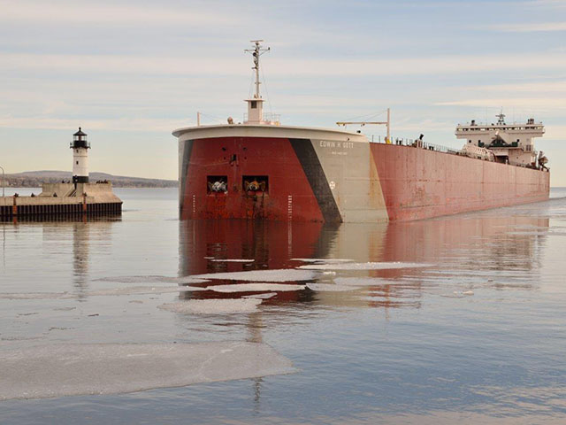 Pictured is the Edwin H. Gott, arriving early last year in the Port of Duluth-Superior. The Edwin H. Gott opened the 2016 Great Lakes shipping season for Duluth when she departed the port early on Tuesday morning, March 22, 2016, for Two Harbors to load iron ore pellets. (Photo by Paul Scinocca, courtesy of Duluth Seaway Port Authority)