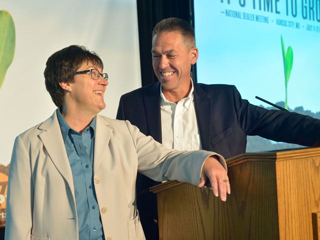 Great Plains president Linda Salem and Kubota Vice President Todd Stucke are like proud parents. They recently reassured Great Plains dealers that after buyout, the Great Plains brand will continue to function, largely independent of new owners Kubota. (DTN/The Progressive Farmer photo by Jim Patrico)