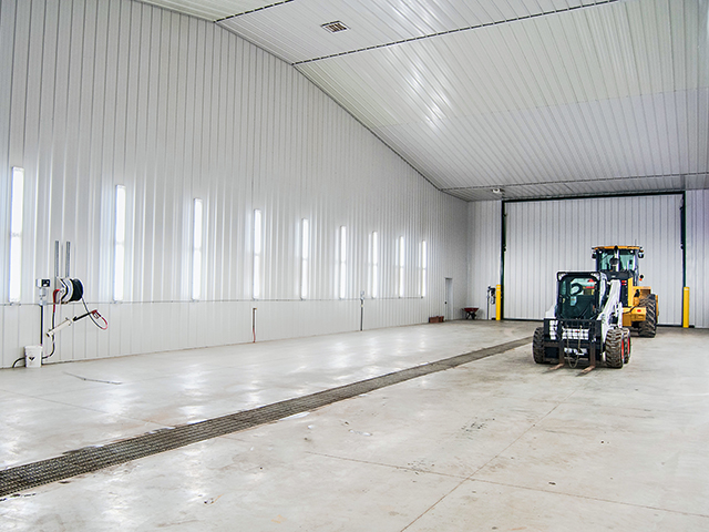 This 40-foot-wide x 125-foot-long wash bay helps Vaughn Zacharias and son Vance keep equipment clean even in winters on their Kathryn, North Dakota, farm. (DTN/The Progressive Farmer photo by Rob Lagerstrom)