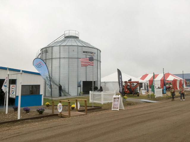 Yield prospects for corn still seem to be as murky as the skies over the Husker Harvest Days farm show near Grand Island, Nebraska. (DTN photo by Bryce Anderson)