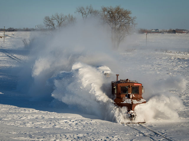 BNSF snow dozer (there&#039;s a locomotive pushing it behind that cloud of snow) clearing rail tracks of snow in the Jamestown, North Dakota, Subdivision in mid-January 2017. BNSF employees have been handling heavy snowfall along parts of their network in the north since late November, 2016. (Photo courtesy of the BNSF Railway)