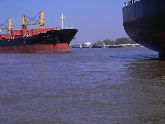 These barges and ships pictured on the Mississippi River near Destrehan, Louisiana, north of Baton Rouge, have not yet been affected by Tropical Storm Harvey. However, as a result of the storm, the Houston/Galveston and Corpus Christi ports are in "Port Condition Zulu." Zula is the official marine term that suspends operations and closes ports to incoming and outgoing vessel traffic until otherwise directed by the captain of the Port. (DTN photo by Mary Kennedy)