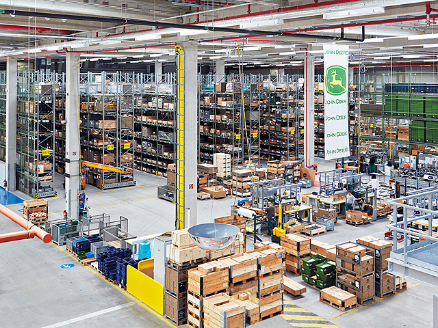 The European Parts Distribution Center in Bruchsal covers 26 acres and serves Europe, North America and beyond. Robots control the storage, picking and processing. (Photo courtesy of John Deere)