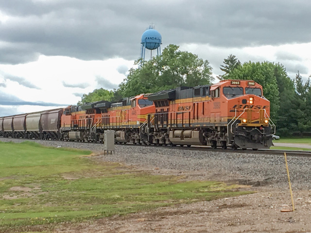 BNSF completed the installation of all mandated positive train control (PTC) infrastructure at the end of 2017, including 88 required subdivisions covering more than 11,500 route miles on its network. Pictured is a BNSF train moving through Randall, Minnesota, along the Northern Trans Con. (Photo by Mary Kennedy)