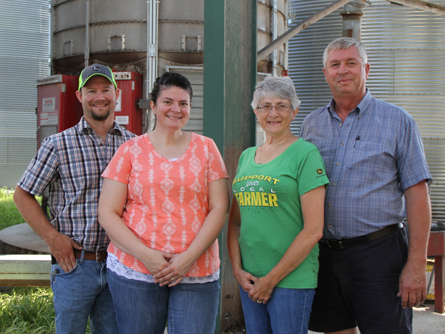 Reporting from Ohio, Genny Haun (center) has allowed readers a look at farming life. She farms with her husband, Matt (left), and her parents, Cindy and Jan Layman. (DTN photo by Pamela Smith)