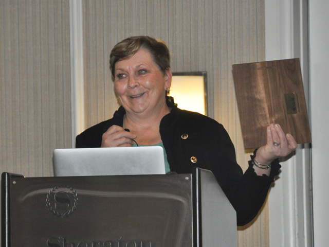 Pamela Smith spoke to scientists after receiving the Excellence in Journalism Award from the Weed Science Society of America. (DTN photo by Emily Unglesbee)