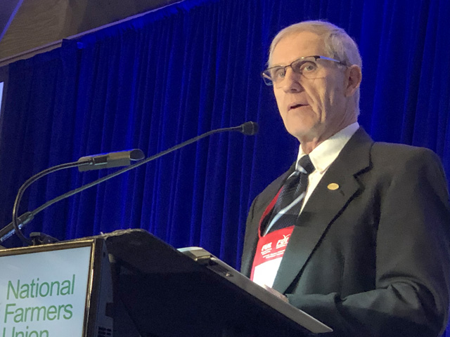 Roger Johnson, president of National Farmers Union, during the opening session of NFU&#039;s annual meeting in Savannah, Ga. In his final major speech before NFU leaders on Sunday evening, he cautioned that MFP payments have disrupted traditional farm programs, which will likely face cuts in the future. (DTN photo by Chris Clayton)