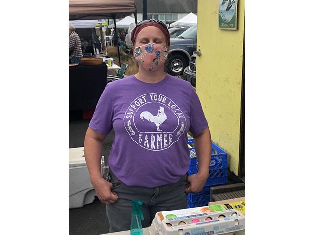 During the depths of COVID, the Newport Farmer&#039;s Market in Newport, Oregon, was a shadow of itself. Sarah Walker of Walker Farms, shown here in September 2020, is now unmasked and she and her husband Randy have continued to sell meat at the market through thick and thin. (Photo courtesy Urban Lehner)