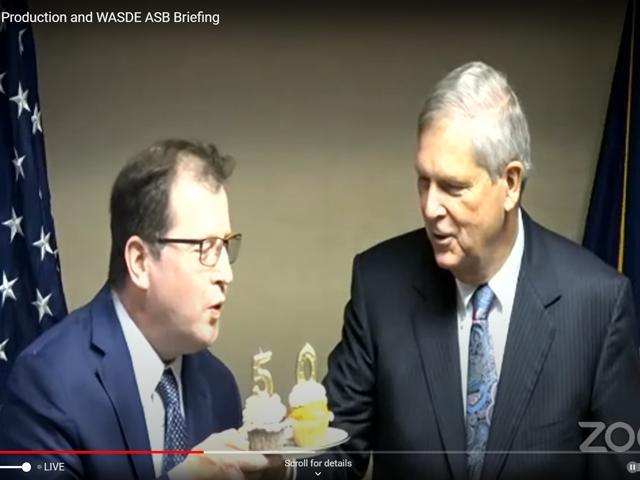USDA Chief Economist Seth Meyer blows out the 50th anniversary candles for the September World Agricultural Supply and Demand Estimates &ndash; the WASDE report. Agriculture Secretary Tom Vilsack offered some comments about the value of the WASDE, which provides farmers a monthly snapshot to question USDA&#039;s logic. (DTN photo from Zoom screenshot) 