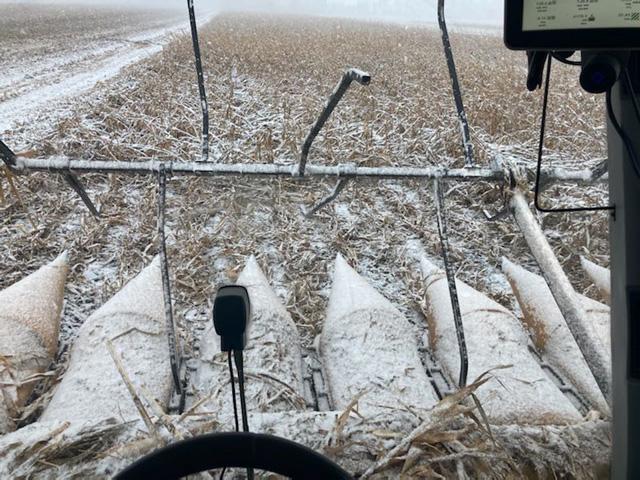 A snow squall hit central Iowa Oct. 19 as Brock Hansen was combining a field of down corn near Baxter. The inclement weather forced him to quit harvesting. (Photo courtesy of Brock Hansen)
