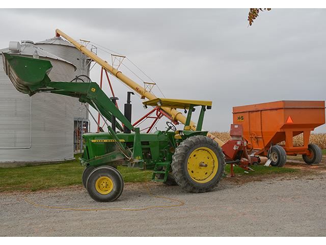 Tractors with rollover protection structures and shields/protective collars on power takeoff shafts help protect farmers during harvest. (DTN/Progressive Farmer photo by Matthew Wilde)