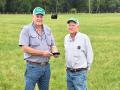 Lynn Brewer (right) manages Henry Griffin&#039;s (left) purebred Angus herd today, relying on practices that have proven their value over the years. (Progressive Farmer image by Becky Mills)