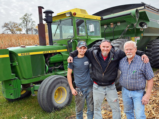 Clayton, Clint and Jim Loeb use mostly vintage John Deere tractors from the 1950s through the 1970s to farm nearly 900 acres of corn. (Progressive Farmer image by Matthew Wilde)