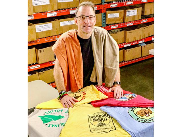 Eric Henry of TS Designs uses regionally-produced cotton for client shirts as well as their own designs. (Des Keller)