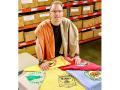 Eric Henry of TS Designs uses regionally-produced cotton for client shirts as well as their own designs. (Des Keller)