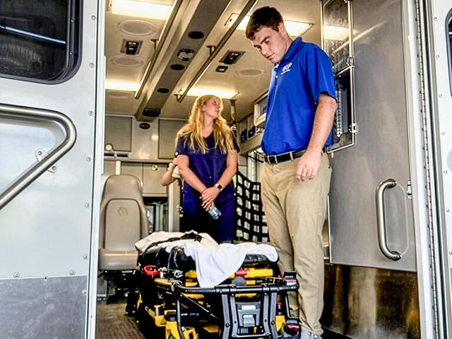 Benjamin VanDiest tours the back of an ambulance at the local fire station as part of Community Hospital's Rural Immersion Program, in McCook, Nebraska. (Courtesy of Benjamin VanDiest)
