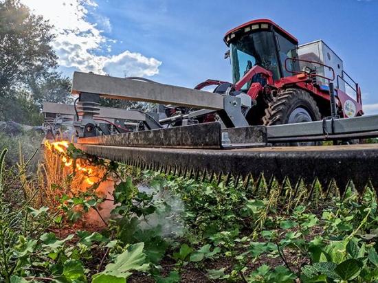 Old School Manufacturing produces the Weed Zapper, a series of tractor-mounted or self-propelled machines designed to eliminate weeds in fields and pastures using high voltage electricity. (DTN photo by Jason Jenkins)