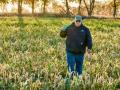 Gabe Brown often carries a spade with him to check improvements to soil health from cover crops. (Des Keller)