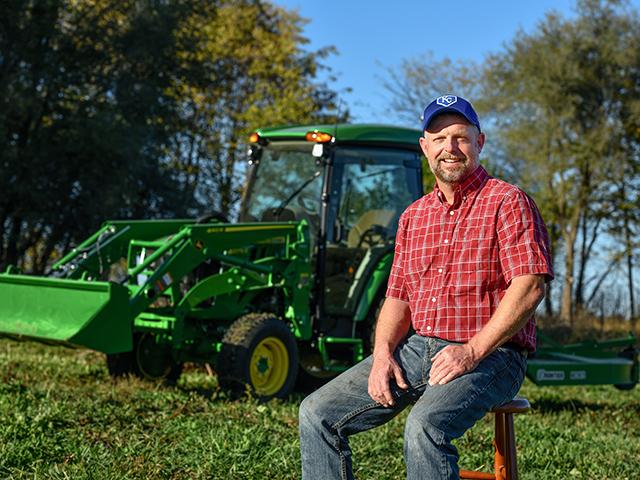 John Clark was impressed with the John Deere 4075R&#039;s handling on slopes when mowing around ponds. (Jim Patrico)