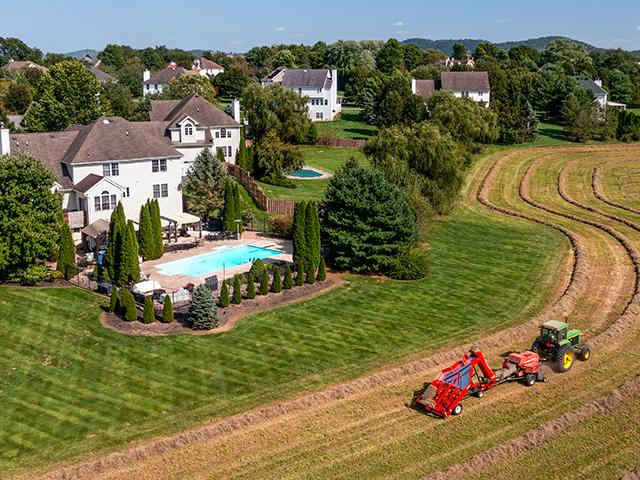 Sam Santini farms 65 different fields amongst subdivisions and neighborhoods in population-dense New Jersey. (Joel Reichenberger)