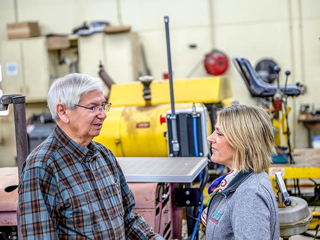 Ron Heller (left), who has been part of Gaynor Cranberry Co. for more than five decades, goes over the daily schedule with business manager Heidi Slinkman. (Mark Moore)
