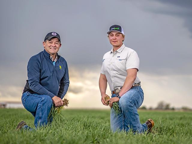 Marc Arnusch (left) with his new farm manager, Clayton Stille, at Arnusch Farms, in Keenesburg, Colorado (Evan Semon)