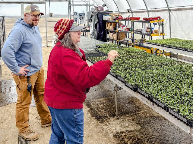 Nic Stapel (left), of Cellanie Farms, Waunakee, Wisconsin, is learning about organic farming from Marbleseed mentor Harriet Behar. (Courtesy of Marbleseed)