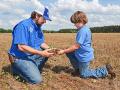 In three years, Billy Helton&#039;s organic levels in cultivated soils have doubled. Billy and son Will take a close-up look. (Progressive Farmer image by Becky Mills)