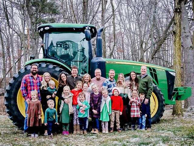 The McKeowns are adopting research-based practices to improve their farm for the next generation. The family includes parents Scott and Debbie, brothers/wives Brian and Amber, Kyle and Alexandra, Patrick and Kathleen, Michael and Megan, plus 12 grandchildren. (Nutrien Dyna-Gro)